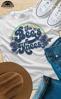 Complete your brunch outfit with our "Bees Knees" shirt that's sure to get nods of approval from bee and nature lovers alike. Our 70s inspired bumble bee shirt is fun for everyone to show off their love of the environment and bees! #Boredwalk #bees Queen Bee Shirt, Hipster Aesthetic, The Bees Knees, Bee Shirt, Bee Lover Gifts, I Love Bees, Vegan Shirts