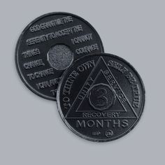 two black coin with the words, security and privacy on it's back side