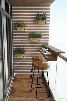 two stools are on the balcony next to some plants