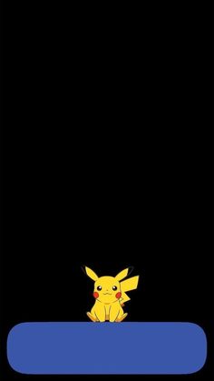 the pikachu is sitting on top of a blue object in front of a black background