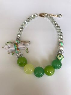 The bestselling unicorn necklace in a new color way -spring green! A crowd pleaser -this neck brings a smile to faces immediately. Great gift or treat yourself. Thanks for looking! Monogram Pendant Necklace, Unicorn Earrings, Monogram Pendant, Unicorn Necklace, Unicorn Toys, Green A, Crowd Pleaser, Pet Necklace, Purse Charms