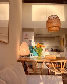 a living room filled with furniture and a wooden table