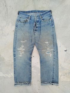 DENIME XX Leather Patch Selvedge Jeans Made in Japan Nicely faded from raw Throughout repaired ACTUAL MEASUREMENT (Inch) Waist 16 Outseam 38 Inseam 27 Leg Opening 8.5 Rise 12 Thigh 12.5 CN681 NOTE 1) All items are 100% authentic. 2) All items should be WASHED before use. 3) Do not rely on tag size as pre-worn items may have been altered, stretched or shrunk. 4) The best way to ensure a correct fit is to compare our measurements with the measurements of a similar item that you know fits you well. 5) Please refer all images, and enlarge them for better details. 6) All measurements are been taken with the garment flat on the floor. 7) NO RETURN NO REFUND AFTER PURCHASE. 8) Please do not expect it to be like new as mostly are used item, unless mentioned as NEW. 9) Actual item might have color Vintage Selvedge Jeans With Standard Cut, Faded Selvedge Denim Jeans, Selvedge Washed Blue Denim Jeans, Vintage Selvedge Denim Blue Bottoms, Faded Selvedge Rigid Denim Jeans, Repair Jeans, Denim Repair, Edwin Jeans, Selvedge Denim