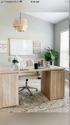 a home office with an l shaped desk