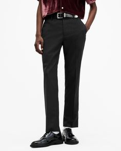 This is how we do modern tailoring. The Blackwater Pants are made from a responsibly sourced wool-blend fabric to a tailored straight-leg silhouette. They're easy to wear, sitting mid-rise with four pockets – they're an instant classic.   These trousers are designed to a tailored fit Button closure Full length Straight leg Four pockets Mid-rise Lightweight Slim Fit Dress Pants With Welt Pockets, Slim Fit Business Pants For Fall, Business Slim Fit Pants For Fall, Fall Business Slim Fit Pants, Tailored Black Work Pants For Business Casual, Elegant Straight Dress Pants For Business, Slim Fit Straight Leg Business Pants, Slim Fit Straight Leg Office Dress Pants, Tailored Straight Office Pants