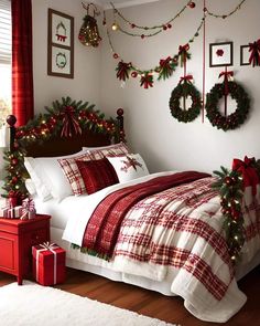 a bedroom decorated for christmas with wreaths and lights on the wall above the bed