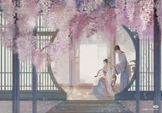 two women dressed in traditional japanese clothing sitting under pink flowers