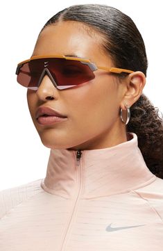 Shield sunglasses in an oversized silhouette offer sporty style with the comfort of soft nose pads and rubber-tipped temples. 66mm lens width; 14mm bridge width; 140mm temple length 100% UV protection Co-injection Imported Running Sunglasses Women, Running Sunglasses, Sporty Sunglasses, Photo Class, Cycling Glasses, Gifts For Runners, Going Places, Shield Sunglasses, Sports Sunglasses