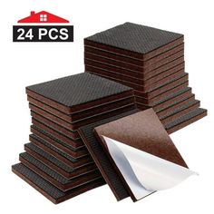 24 pieces of brown foam with white paper on top