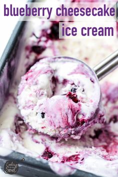 a scoop of blueberry cheesecake ice cream in a metal pan with a spoon