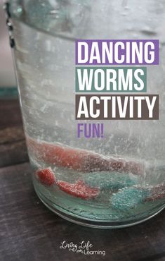 a glass jar filled with water and some red, white and blue substance in it