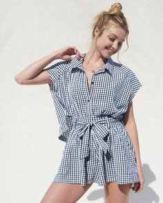 Our Gabrielle Gingham Top is made for all warm weather outdoor activities. Crafted from crinkle cotton with a refreshing gingham print on a boxy button-up silhouette that keeps you cool and comfortable. Pair it with the matching Gabrielle Gingham Short. Crinkle cotton blend Gingham print Spread collar Cap sleeves Front buttons Boxy fit Summer Seersucker Tops With Relaxed Fit, Relaxed Fit Seersucker Tops For Summer, Casual Seersucker Tops With Relaxed Fit, Spring Seersucker Tops, Crinkle Cotton, Gingham Top, Gingham Shorts, Gingham Tops, Gingham Print