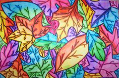 a colorful painting with leaves on it