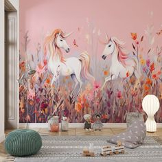 two unicorns are in the middle of a room with flowers and butterflies on the wall