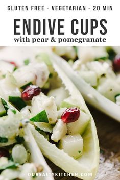 an image of endive cups with pears and pomegranate on them