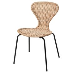 a wicker chair with black metal legs