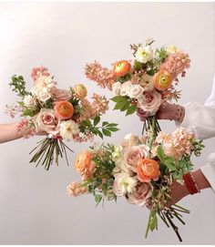 three brides holding bouquets of flowers in their hands