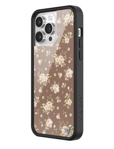 the back of an iphone case with flowers on brown and white background, showing the camera lens