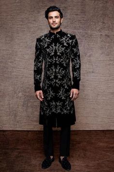 Black sherwani in velvet base fabric with cutdana floral pattern all-over. Comes with pant.
Component: 2
Pattern: Embroidered
Type Of Work: Cutdana
Neckline: Mandarin
Sleeve Type: Straight Full
Fabric: Velvet
Color: Black
Other Details: 
Front button down sherwani
Side slit
Floral motif embroidery
Occasion: Destination Wedding - Aza Fashions Black Velvet Sherwani For Men, Black Velvet Wedding Dress, Sawan Gandhi, Sherwani Groom Wedding, Velvet Sherwani, Wedding Suits Men Blue, Black Sherwani, Sherwani For Men Wedding, Wedding Kurta For Men