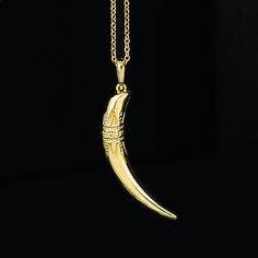 "☆ Made of solid 14k gold (not plated, not filled, not vermeil), the Tusk Pendant is available in your choice of yellow, white, or rose gold as well as platinum ☆ Available as a pendant only or as a necklace with an adjustable cable chain Metal: 14K Solid Real Gold or Platinum Length (including bail): 26.2mm (1.00 inches) Length (without bail): 21.4mm (0.84 inches) Width: 12.5mm (0.49 inches) Thickness: 3.7mm (0.15 inches) Chain Passage Dimensions: 4mm x 3mm Chain Length: 16-18\" Chain Style: Ca Classic Crescent Jewelry As A Gift, Gold Crescent Jewelry For Formal Occasions, Classic Crescent Jewelry For Gifts, Classic Crescent Jewelry For Gift, Classic Crescent Jewelry Gift, Classic Crescent-shaped Gift Jewelry, Elegant Engraved Crescent Necklace, Elegant Crescent Engraved Necklace, Crescent 14k Gold Engraved Necklace