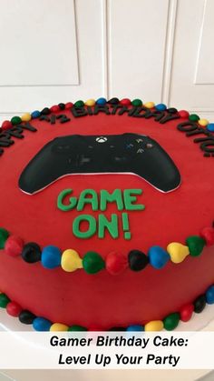 a birthday cake with a video game controller on it