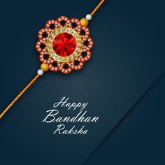 an elegant rakha with red stone and pearls on the end is decorated with gold beads