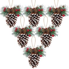 six pine cones decorated with berries and ornaments