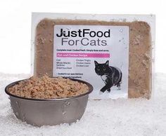 a bowl of cat food next to a package of justfood for cats