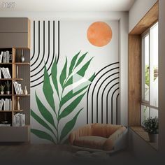 a living room with an orange and green wall mural on the wall next to a book shelf