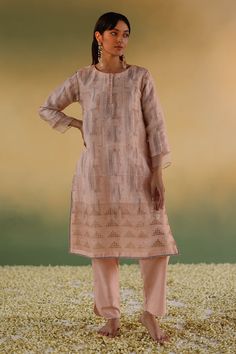 Pink straight fit geometric self design kurta crafted in pure linen and silk handloom base with sequin weave.
Components: 1
Pattern: Woven
Type Of Work: Sequin
Neckline: Round Neck
Sleeve Type: Three Quarter Sleeves
Fabric: Pure Linen Silk Handloom
Color: Pink
Other Details: 
Potli buttons
Scallop trim cuffs
Note: Dupatta and pant worn by the model is not for sale
Occasion: Puja,Mehendi and Haldi - Aza Fashions Handloom Kurta, Design Kurta, Pink Kurta, Kurta For Women, Scallop Trim, Self Design, Fashion App, Kurta Designs, Pure Linen