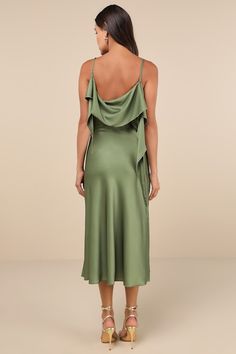 The Tyler McGillivary Thistle Green Multi Satin Cowl Neck Midi Dress is ready to transport you and everyone you meet to a world of whimsy! Glossy woven satin boasts a large-scale thistle print as it shapes adjustable spaghetti straps and a fold-over, cowl neckline and back, with long, twisting sash tendrils at the sides. The figure-skimming bodice continues into a flowy A-line skirt with a chic midi hem. Hidden side zipper. Fit: This garment fits true to size. Length: Mid-calf length. Size mediu Green Silk Slip Dress With Satin Finish, Green Satin Midi Length Slip Dress, Green Satin Midi Slip Dress, Green Satin Slip Dress Midi Length, Green Satin Silk Midi Dress, Green Silk Dress With Satin Finish, Green Silk Satin Finish Dress, Green Silk Midi Dress With Bias Cut, Green Silk Bias Cut Midi Dress