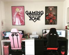 a person sitting at a desk in front of two computer monitors and a pink chair