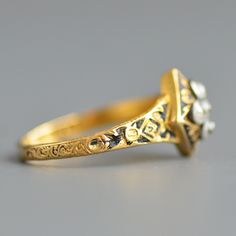 Victorian Enamel Ring For Anniversary, Antique Cluster Ring With Rose Cut Diamonds, Victorian Gold Engraved Ring, Victorian Yellow Gold Enamel Ring For Anniversary, Victorian Style Gold Engraved Ring, Antique Yellow Gold Enamel Ring, Antique Hallmarked Enamel Wedding Ring, Antique Gold Signet Ring With Rose Cut Diamonds, Victorian Enamel Ring Engraved For Anniversary