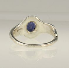 R1114- Sterling Silver Ring with a 7 x 5 mm Iolite, AAA quality, Size 8.5 . I can size it to fit, just contact me. No charge to size down, and no charge for one size up. The top of the ring measures 12 mm and the band is 2 mm. This ring is made by the Lost wax Casting method, were I make the design in wax and then cast it into silver. To learn more about Me and the Lost Wax Method please visit my website at www.denimanddiamondsjewelry.com Thanks for visiting, If you have any questions please fee Swiss Blue Topaz Ring, Artisan Rings, Wax Casting, Casting Jewelry, Cabochon Ring, 925 Ring, Swiss Blue Topaz, Lost Wax, Moonstone Ring