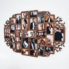 a collage of photos is arranged in a wooden frame on the wall with leaves