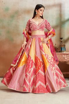 Buy orange and pink embroidered Banarasi silk lehenga online in USA with dupatta. Look your best on festive occasions in latest designer saris, pure silk sarees, Kanjivaram silk sarees, handwoven saris, tussar silk sarees, embroidered saris from Pure Elegance Indian clothing store in USA.-full view Orange Embroidered Choli For Reception, Embroidered Orange Choli For Reception, Semi-stitched Orange Choli With Intricate Embroidery, Orange Semi-stitched Choli With Intricate Embroidery, Designer Orange Lehenga With Intricate Embroidery, Anarkali Orange Lehenga With Intricate Embroidery, Orange Lehenga With Intricate Embroidery For Festivals, Orange Chanderi Lehenga With Resham Embroidery, Orange Embroidered Chanderi Lehenga