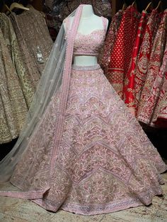 Lemonade pink intricate with fully sequence thread embroidery and crystal stone work lehenga paired with sweetheart neckline blouse and net dupatta. Pink Shimmery Lehengas Which Are To Die For! Fabric:Net Size:38 Ready to Ship! Pink Kundan Dupatta With Intricate Embroidery, Designer Pink Embroidered Lehenga, Pink Embroidered Lehenga For Reception, Designer Pink Lehenga With Intricate Embroidery, Designer Lehenga With Intricate Embroidery In Pink, Pink Anarkali Set With Intricate Embroidery For Reception, Pink Kundan Embroidered Fabric For Wedding, Pink Lehenga With Intricate Embroidery In Traditional Drape, Party Wear Embellished Lehenga For Wedding