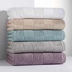 five towels stacked on top of each other