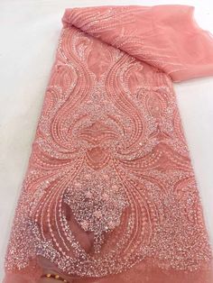 This high quality Fabric is measured in 5 Yards With Embroidered Beading and Sequin. It is soft, very delicate and beautiful. This high Quality Fabric is made with Fashion embroidered rhinestones can be used in making party wedding dresses, skirts, shawls, scarves and other other fashion apparels as you would like. Size : Length : 5 yards (180 inch). Width: 50 inch (Please allow slight deviation for the measurement data ,±1 inch) Material: 100% Polyester, Tulle Lace Fabric, Eco-Friendly embroidery Making Fabric, Peach Lace, Beaded Tulle, Luxury Fabric, Sequin Beading, Tulle Lace, Lace Design, Beaded Lace, Wedding Party Dresses