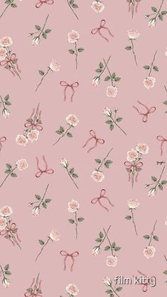 a pink wallpaper with flowers and scissors