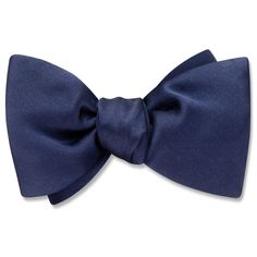 The quintessential formal silk tie in lustrous navy blue.Handcrafted in Middlebury, Vermont. Classic Pre-tied Satin Bow Tie, Blue Elegant Suit And Tie Accessories For Formal Occasions, Elegant Blue Ties, Classic Pre-tied Bow Tie, Classic Pre-tied Bow With Ties, Classic Pre-tied Decorative Bow, Classic Pre-tied Bow, Classic Blue Ties For Formal Occasions, Classic Solid Color Bow With Ties