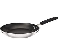 an empty frying pan on a white background