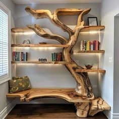 a wooden tree branch sitting on top of a shelf