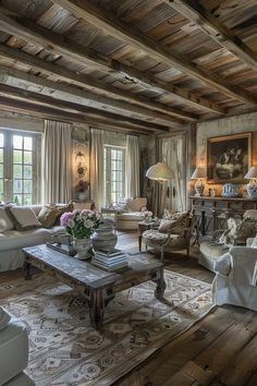 a living room filled with furniture and lots of windows