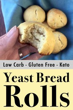 a person holding a piece of bread in their hand with the words yeast bread rolls on it