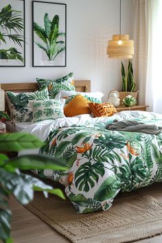 a bed with green leaves on it in a bedroom