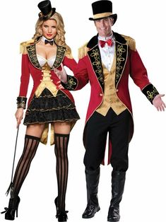 man and woman dressed in fancy costumes