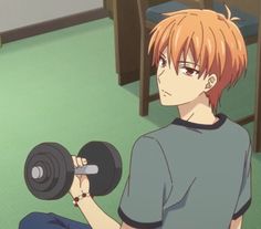 an anime character is sitting on the floor with dumbbells in his hand and looking at something