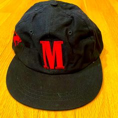 Vintage 90s Marlboro Black/Red Adjustable Hat Never Worn, Brand New Condition. Hat Does Need Some Reshaping From Years Of Storage. Retro Black Cotton Snapback Hat, Vintage Short Brim Hat For Streetwear, Vintage Cotton Snapback Hat With Short Brim, Vintage Short Brim Baseball Cap For Streetwear, Vintage Baseball Cap With Short Brim For Streetwear, Vintage Black Cotton Baseball Cap, Vintage Black Cotton Hat, Vintage Brimmed Hats For Streetwear, Vintage Brimmed Streetwear Hats