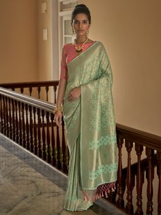 Experience the epitome of elegance with our exquisite pista green silk saree, adorned with intricate weaving work. This stunning saree, measuring 5.50 meters, is a perfect blend of tradition and modernity, making it an ideal choice for any festive occasion, event, or celebration. The rich pista green hue symbolizes freshness and tranquility, offering a serene yet vibrant appearance that stands out beautifully.
Complementing the saree is a gorgeous pink silk blouse material, also featuring delica Pista Green Saree, Saree Pallu, Bollywood Glamour, Pista Green, Blouse Details, Purple Saree, Orange Saree, Ethnic Sarees, Satin Saree